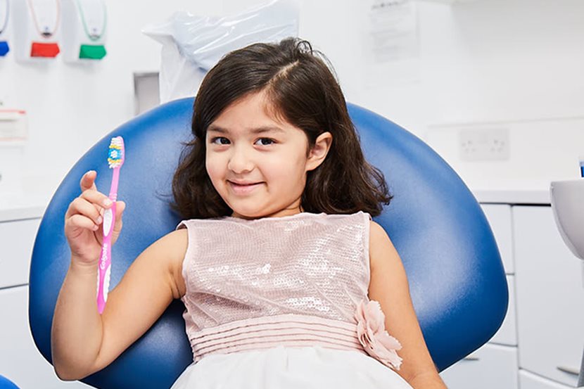 Brushing-Your-Teeth.jpg Child with tooth brush